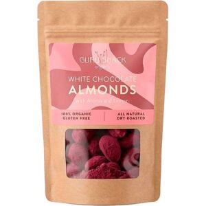 Stand-up kraft bag of GurúnSnack white chocolate almonds with aronia and lemon; pink label and a window showing red almonds inside (organic, gluten-free, dry roasted).