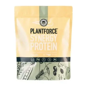 Cream-colored PlantForce Synergy Protein powder bag with a green vertical stripe and botanical illustrations along the bottom.