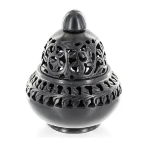 Black metal ornate incense burner with a domed lid and intricate openwork floral pattern, on a white background.